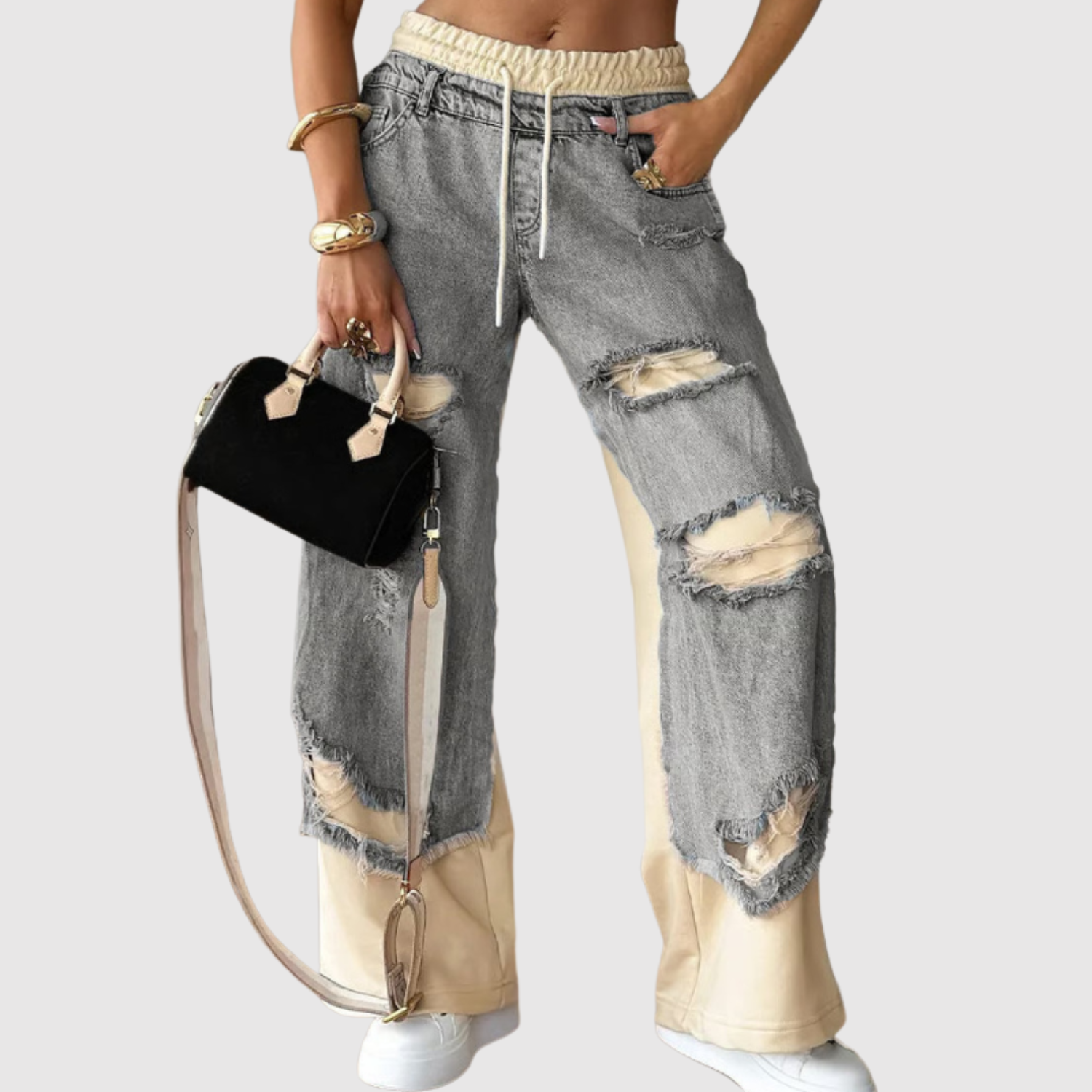 Kira – Jeans avec déchirures et détails tendance
